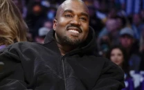kanye west sells swastika shirts after super bowl ad sends fans to website kanye west sells swastika shirts after super bowl ad sends fans to website