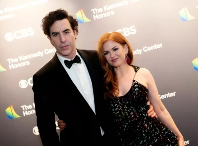 sacha baron cohen isla fisher s 75 million divorce remains amicable despite reports of conflict