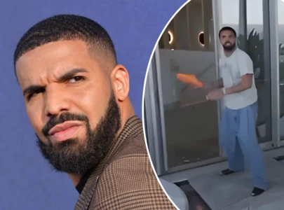 drake throws slipper at drone spying on his australian penthouse internet reacts