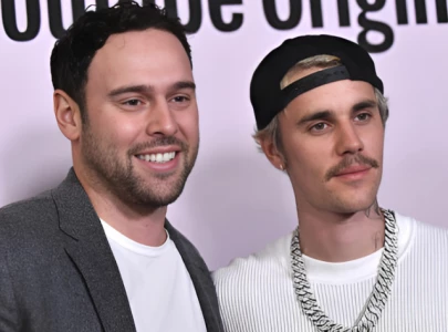 justin bieber reportedly owes 8 million to scooter braun after tour collapse and audit dispute