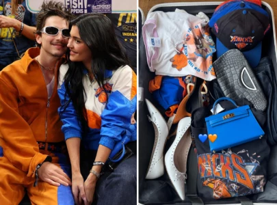 kylie jenner flaunts suitcase packed with knicks merchandise for courtside date night with timoth e chalamet kylie jenner flaunts suitcase packed with knicks merchandise for courtside date night with timoth e chalamet