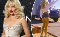 sabrina carpenter unveils mysterious teaser and billboard campaign for rumoured new song manchild