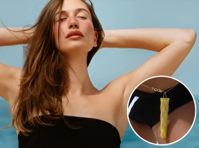 hailey bieber debuts new rhode lip tint with y2k inspired belly chain after viral phone case