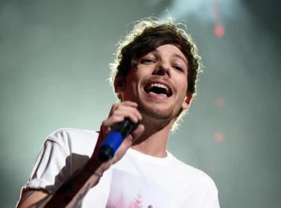louis tomlinson calls out conspiracy chats about his personal life in emotional post
