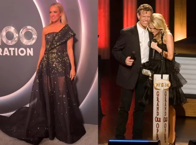 carrie underwood honours randy travis at opry 100 with heartfelt tribute
