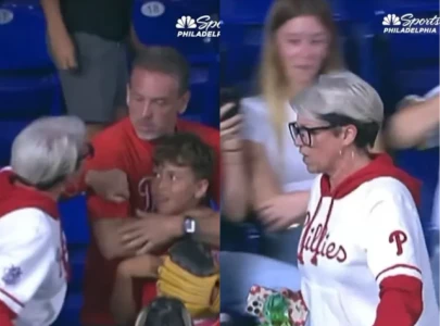 phillies fan goes viral for clashing with dad over home run ball during marlins game phillies fan goes viral for clashing with dad over home run ball during marlins game