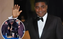 comedian tracy morgan vomits courtside at knicks heat game delays play before being wheeled out comedian tracy morgan vomits courtside at knicks heat game delays play before being wheeled out