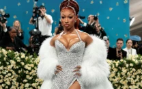 megan thee stallion mocks critics after breaking met gala no phones rule megan thee stallion mocks critics after breaking met gala no phones rule