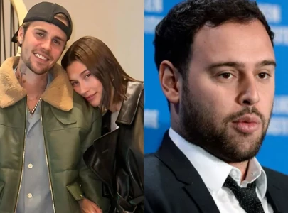 hailey bieber seemingly takes dig at scooter braun after ex manager praises justin s new album