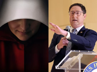 handmaids trail us rep mike flood in viral tiktok protest at lincoln district office
