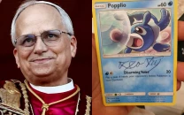pok mon fan goes viral for claiming pope leo signed his popplio card pok mon fan goes viral for claiming pope leo signed his popplio card