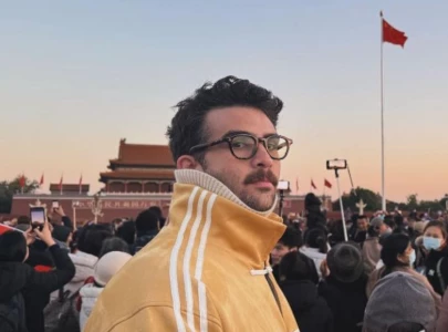 hasanabi confronted by chinese security in tiananmen square after displaying controversial meme