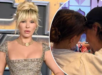 millie bobby brown goes full mama bear mode as paparazzi swarm amid outing with daughter millie bobby brown goes full mama bear mode as paparazzi swarm amid outing with daughter