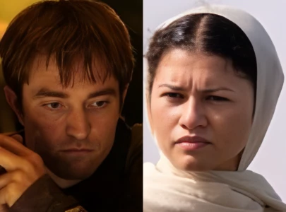 new photos from christopher nolan s the odyssey offer first look at robert pattinson and zendaya