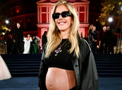 ellie goulding expecting second child with beau minniear reveals bump at fashion awards 2025