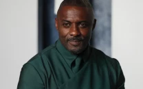 idris elba fuels speculation he s next james bond after madame tussauds video