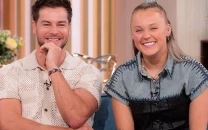is chris hughes planning a christmas proposal to jojo siwa couple address engagement talk