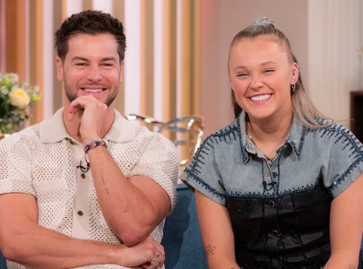 is chris hughes planning a christmas proposal to jojo siwa couple address engagement talk