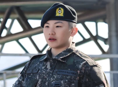seventeen s woozi faces controversy during military enlistment after army executive s wedding request