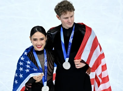 fans rally behind madison chock and evan bates after controversial french pair win olympic gold