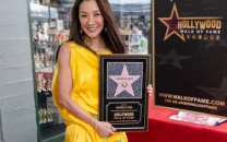 michelle yeoh receives hollywood walk of fame star after four decade career