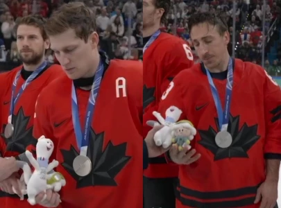 canadian men s hockey players reaction to stuffed toy after olympic defeat against usa goes viral