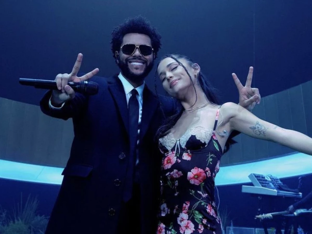 is the weeknd releasing a new song with ariana grande singer teases collaboration with cryptic post