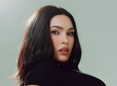 megan fox returns to instagram with new photos as mgk posts flirty comment