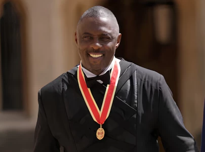 idris elba receives knighthood from king charles at windsor castle