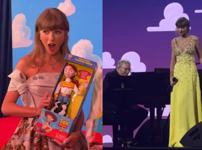 taylor swift makes surprise appearance at toy story 5 la premiere performs new song with randy newman taylor swift makes surprise appearance at toy story 5 la premiere performs new song with randy newman