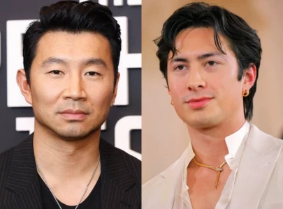 simu liu speaks out to defend hudson williams amid nazi symbol photo controversy simu liu speaks out to defend hudson williams amid nazi symbol photo controversy