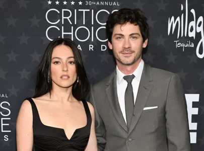 logan lerman marries longtime partner analuisa corrigan in private la wedding ceremony