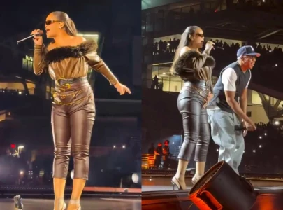 rihanna joins jay z for surprise performance at yankee stadium concert