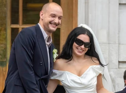 charli xcx marries the 1975 s george daniel in london fans notice matty healy s absence