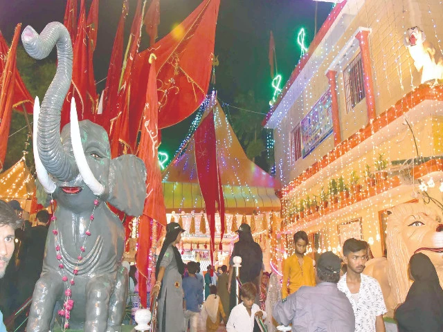 members of the hindu community gather at durga shiv mandir in hyderabad to celebrate the vibrant dussehra festival marked by devotional rituals festive d cor and twinkling lights the night time celebration reflects the city s enduring spirit of cultural harmony and tradition photo ppi