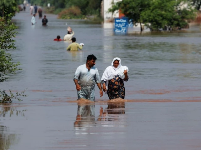 residents of qadirabad village near chenab river photo reuters residents of qadirabad village near chenab river photo reuters