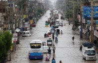vehicles move along a flooded road following monsoon rains and rising water levels in sialkot punjab province pakistan august 27 2025 photo reuters