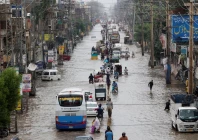 vehicles move along a flooded road following monsoon rains and rising water levels in sialkot punjab province pakistan august 27 2025 photo reuters