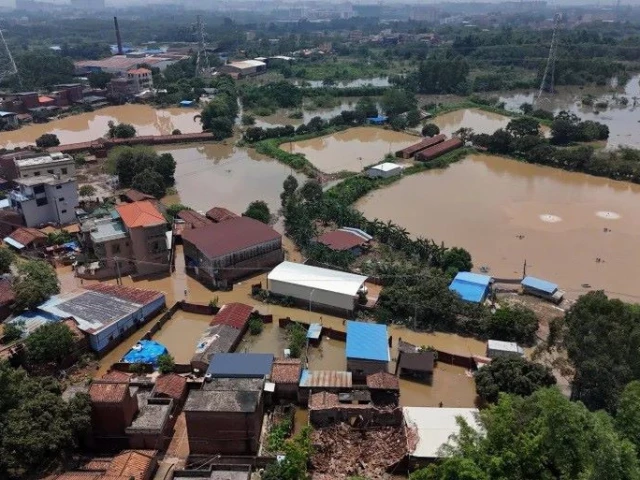 a drone view shows flooded houses and fish farms after days of heavy rainfall in qingyuan guangdong province china august 8 2025 photo reuters