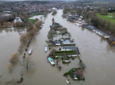 britain hit by flooding after heavy rain swells major rivers