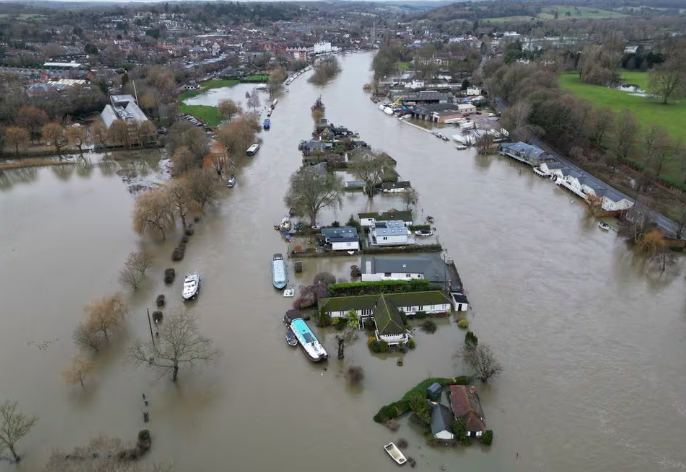 an aerial view shows properties surrounded by floodwater in the aftermath of storm henk on an island in the river thames at henley on thames britain january 5 2024 photo reuters