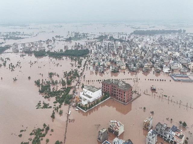 this aerial view shows partially submerged residential buildings following the overflowing of the ravi river in lahore photo afp this aerial view shows partially submerged residential buildings following the overflowing of the ravi river in lahore photo afp