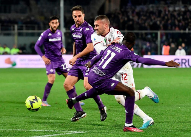 fiorentina deny milan second spot