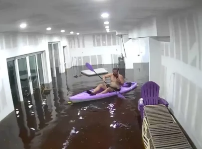 florida man kayaks inside flooded home during hurricane helene