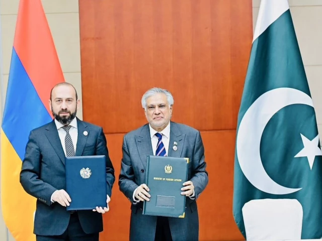 foreign minister mohammad ishaq dar and his armenian counterpart ararat mirzoyan exchange joint communiqu on the sidelines of the 25th sco summit in tianjin china photo x foreign minister mohammad ishaq dar and his armenian counterpart ararat mirzoyan exchange joint communiqu on the sidelines of the 25th sco summit in tianjin china photo x