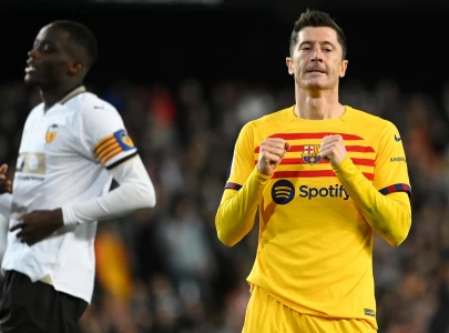 barca give away points at valencia atletico stumble