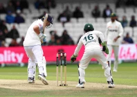 england s joe root smiles at pakistan s stumper mohammad rizwan on day 2 of the first test between england and pakistan at headingley on august 20 2026 photo afp