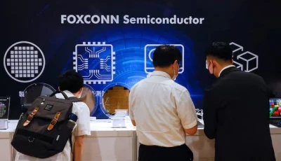 foxconn shareholders look at wafers on display after the annual shareholder meeting in new taipei city taiwan may 31 2023 reuters