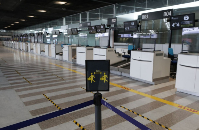 a sign to respect social distancing is seen at deserted check in desks at nice international airport as france closed its borders to travellers outside european union due to restrictions against the spread of the coronavirus disease covid 19 in france february 1 2021 reuters eric gaillard a sign to respect social distancing is seen at deserted check in desks at nice international airport as france closed its borders to travellers outside european union due to restrictions against the spread of the coronavirus disease covid 19 in france february 1 2021 reuters eric gaillard