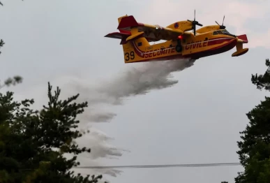 a canadair firefighting aircraft works to contain wildfires at the fontainebleau forest in acheres la foret as a heatwave affects large parts of france july 13 2026 photo reuters file